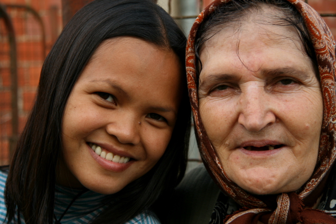 jane with local woman in krapje.JPG